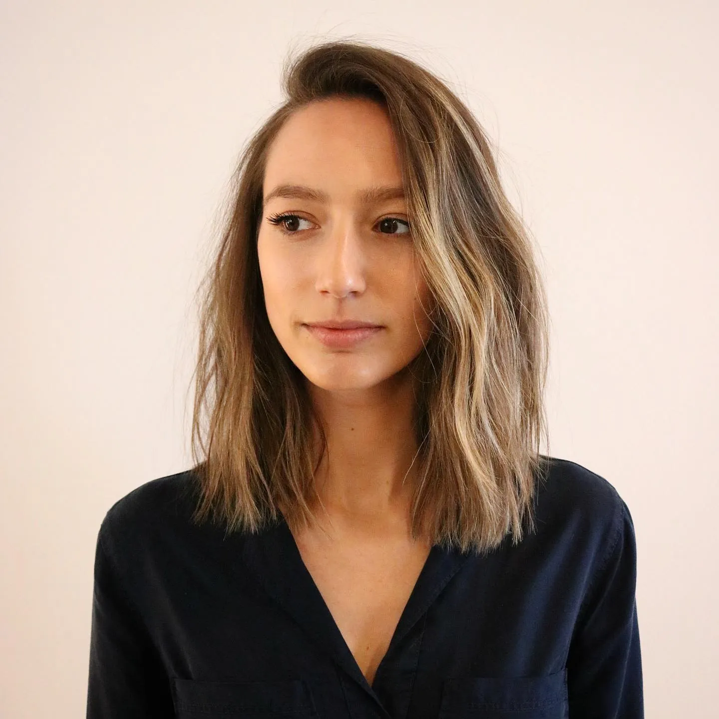 Soft layered side-part lob with light textured ends
