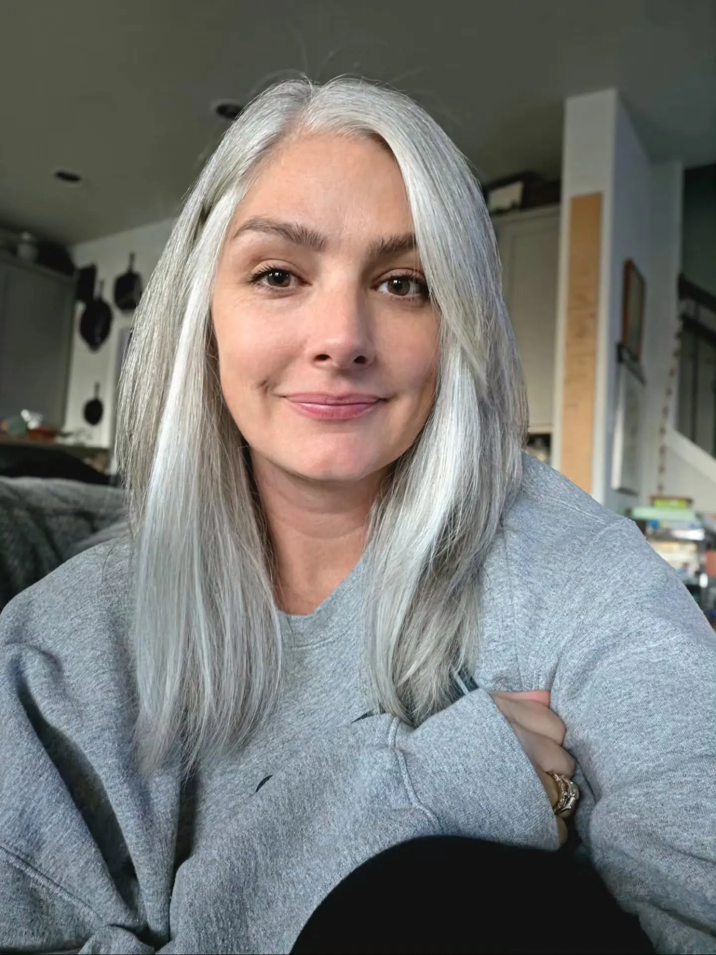 Long straight silver hair with centre part