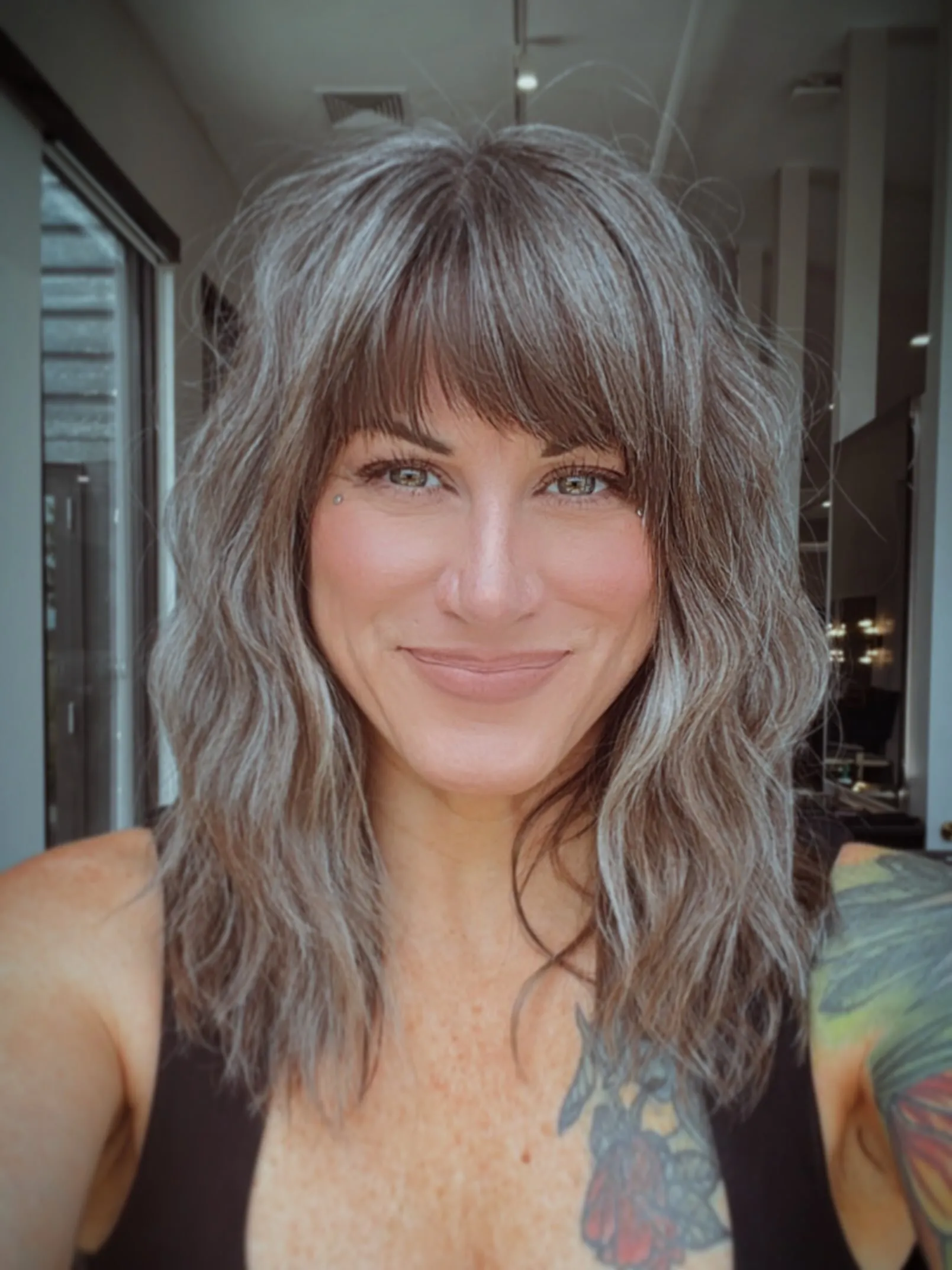Silver shag with fringe and choppy waves