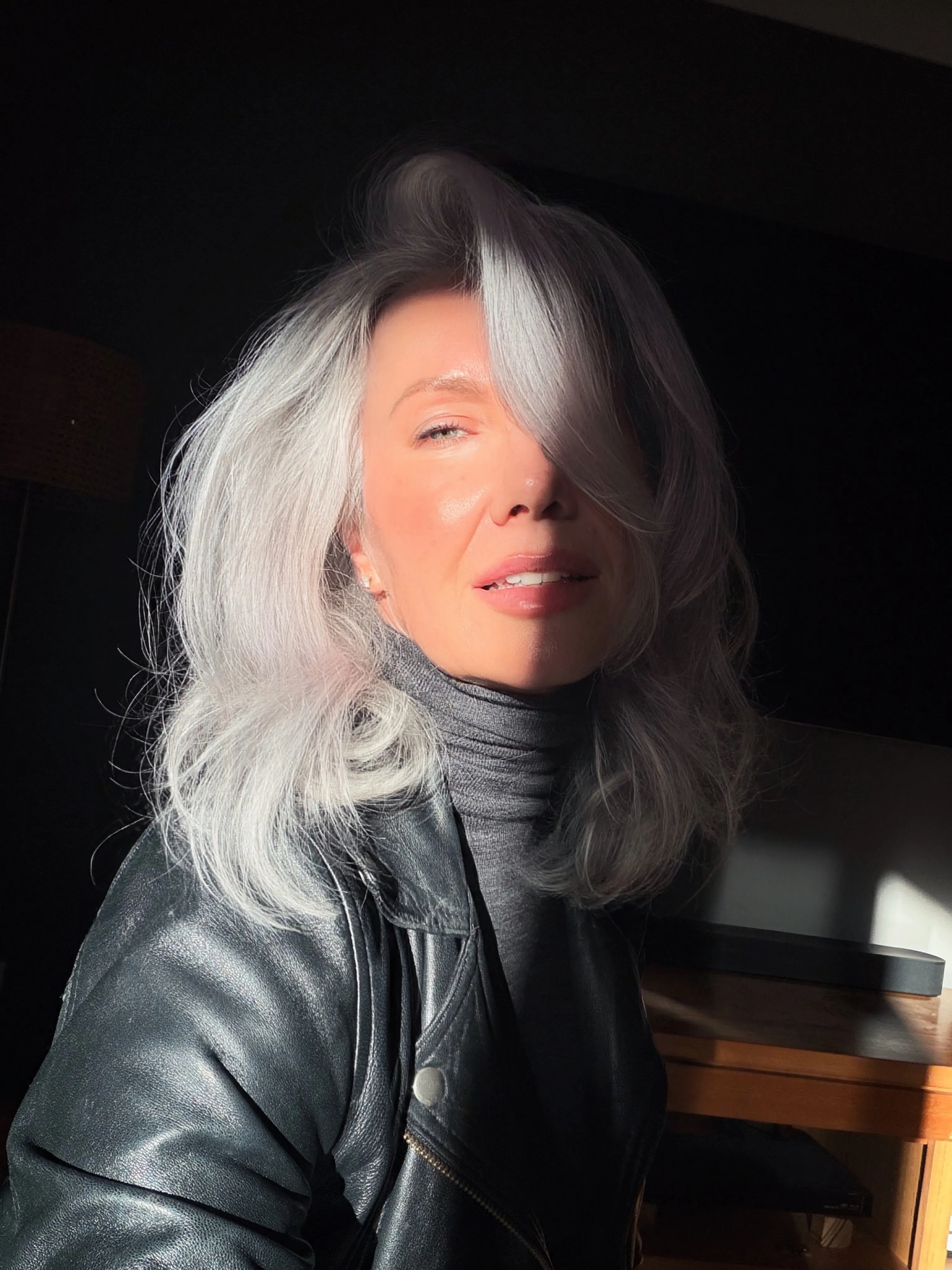 White silver lob with soft waves and dark roots