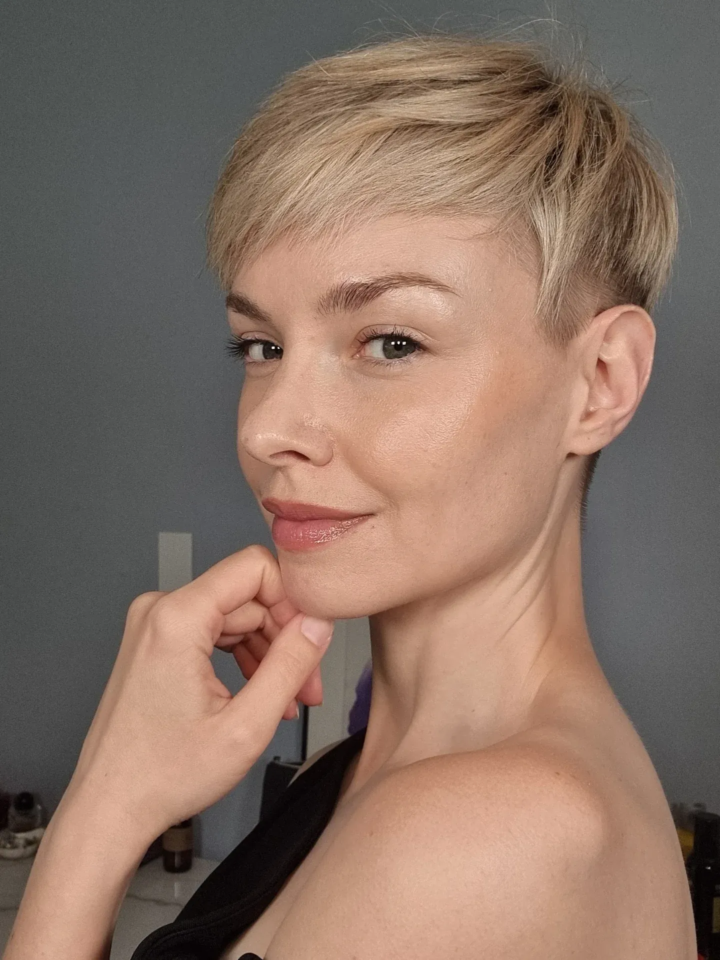 Blonde side-swept pixie with closely cropped undercut