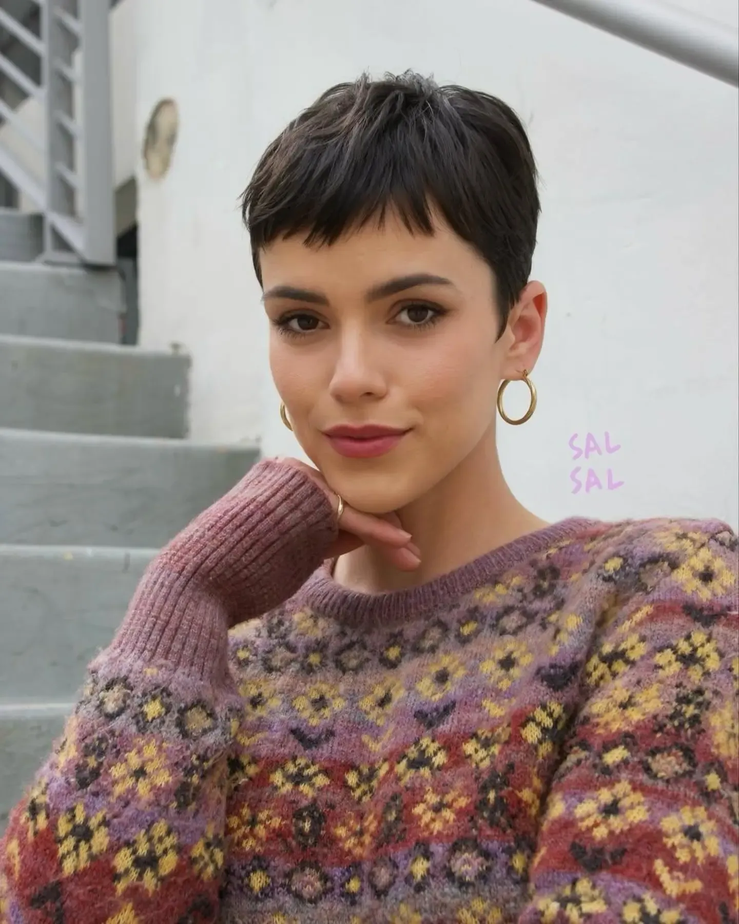Dark sleek pixie with straight micro bangs