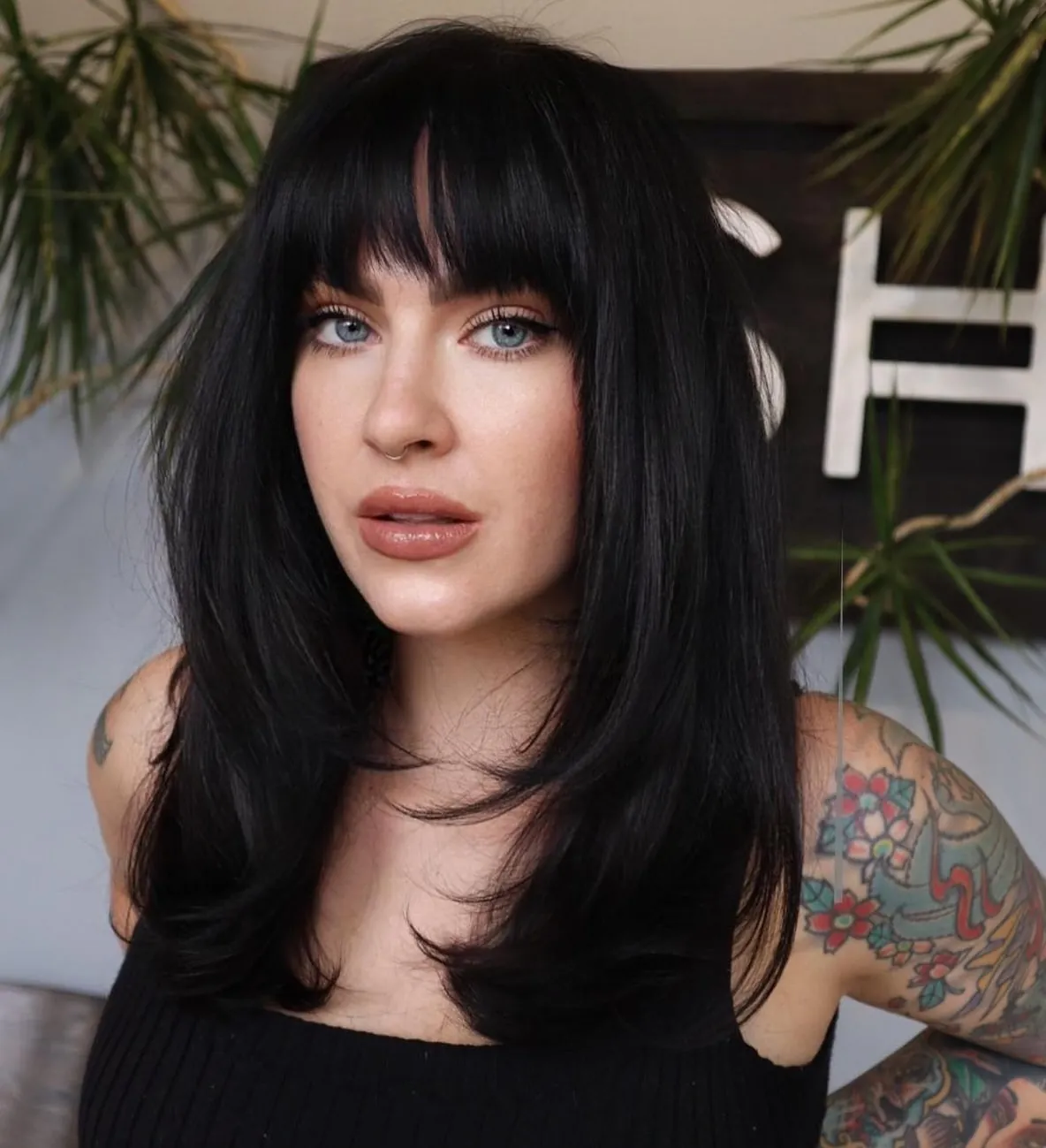 Black Shag With Bangs showing soft black hair colour