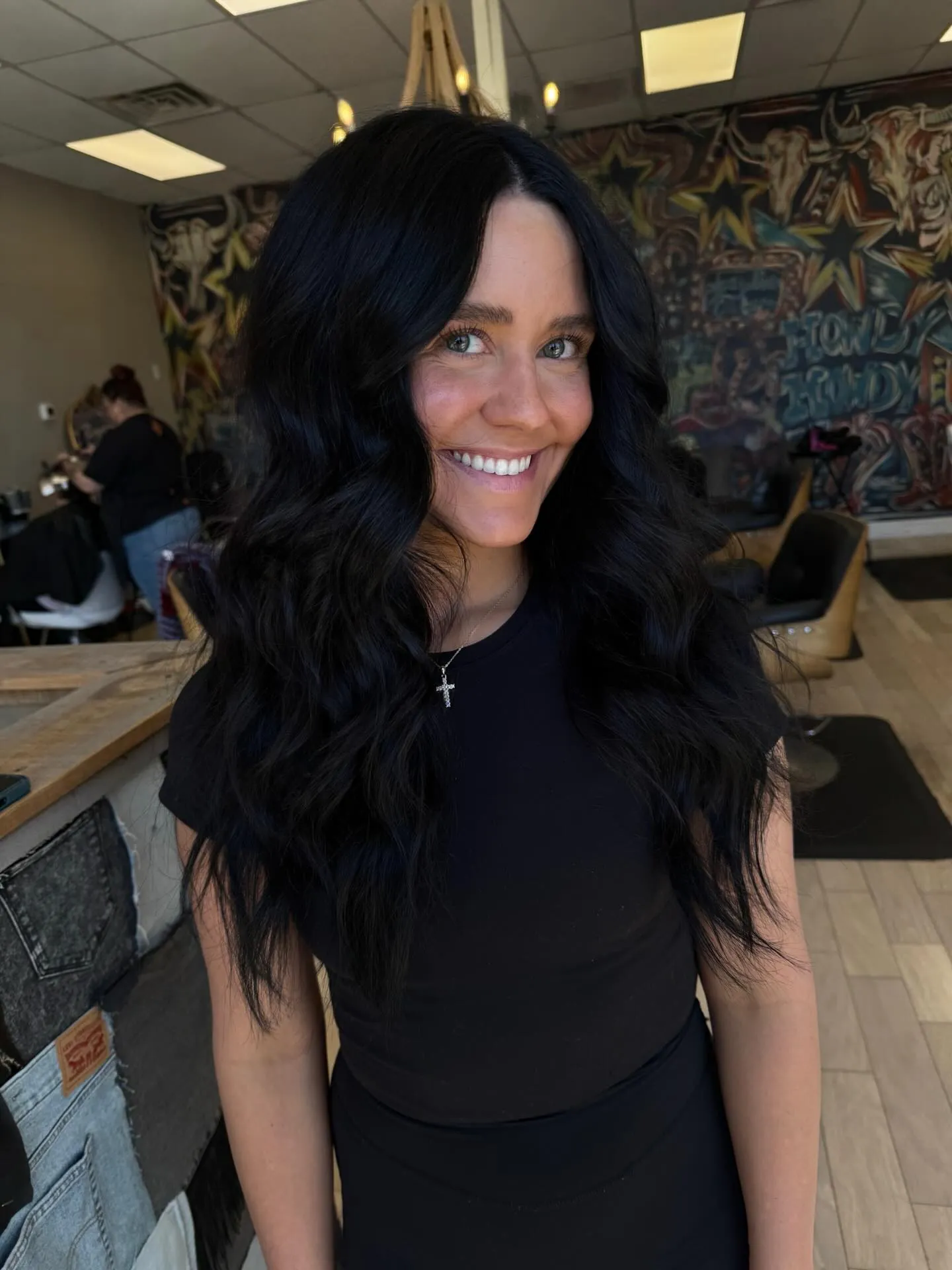 Long Voluminous Waves showing soft black hair colour