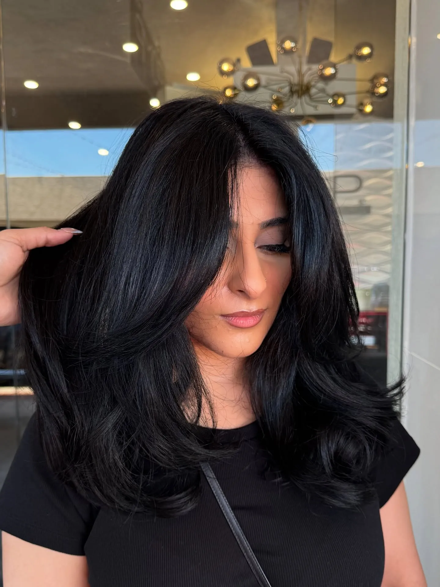 Rounded Black Blowout showing soft black hair colour