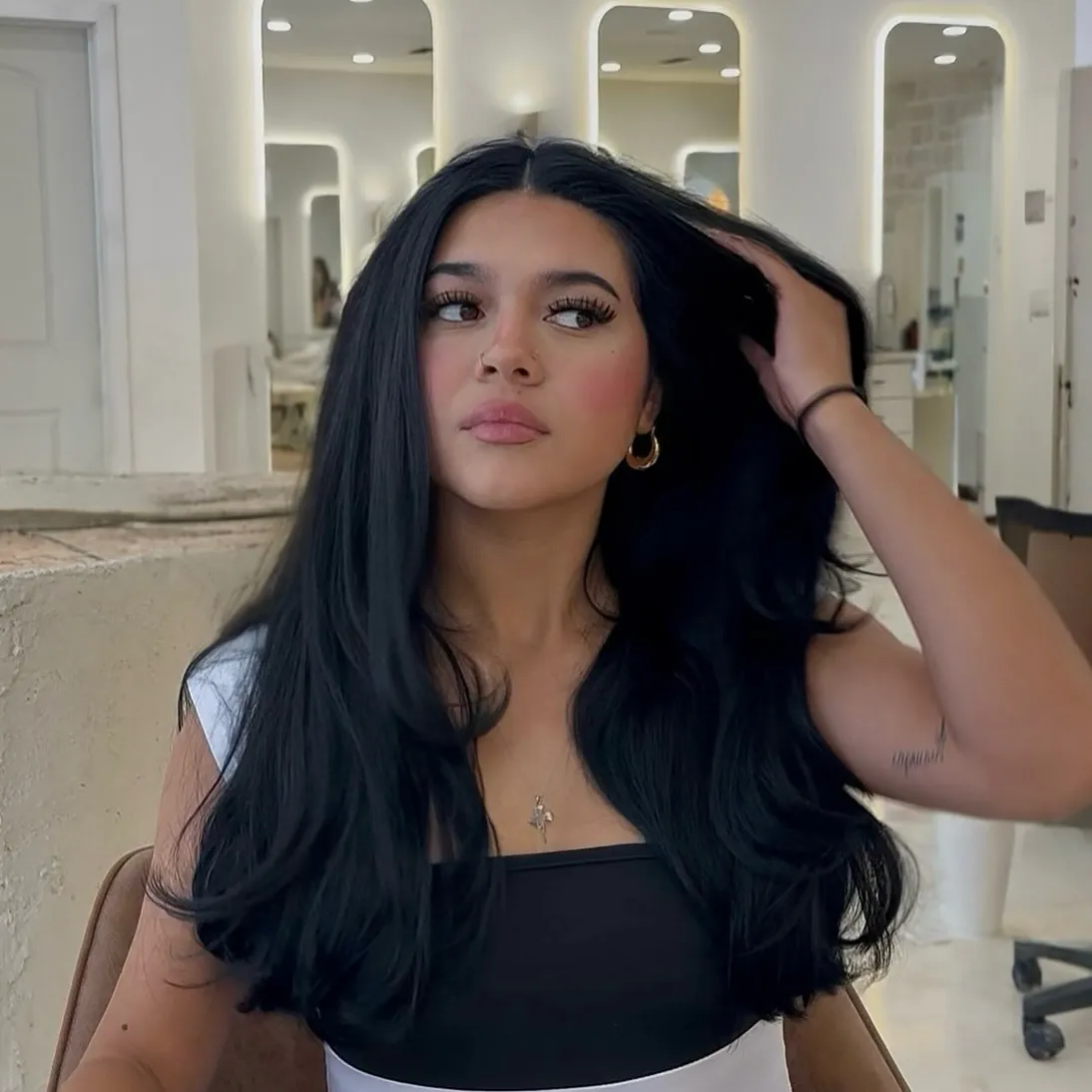 Voluminous Soft Black Waves showing soft black hair colour