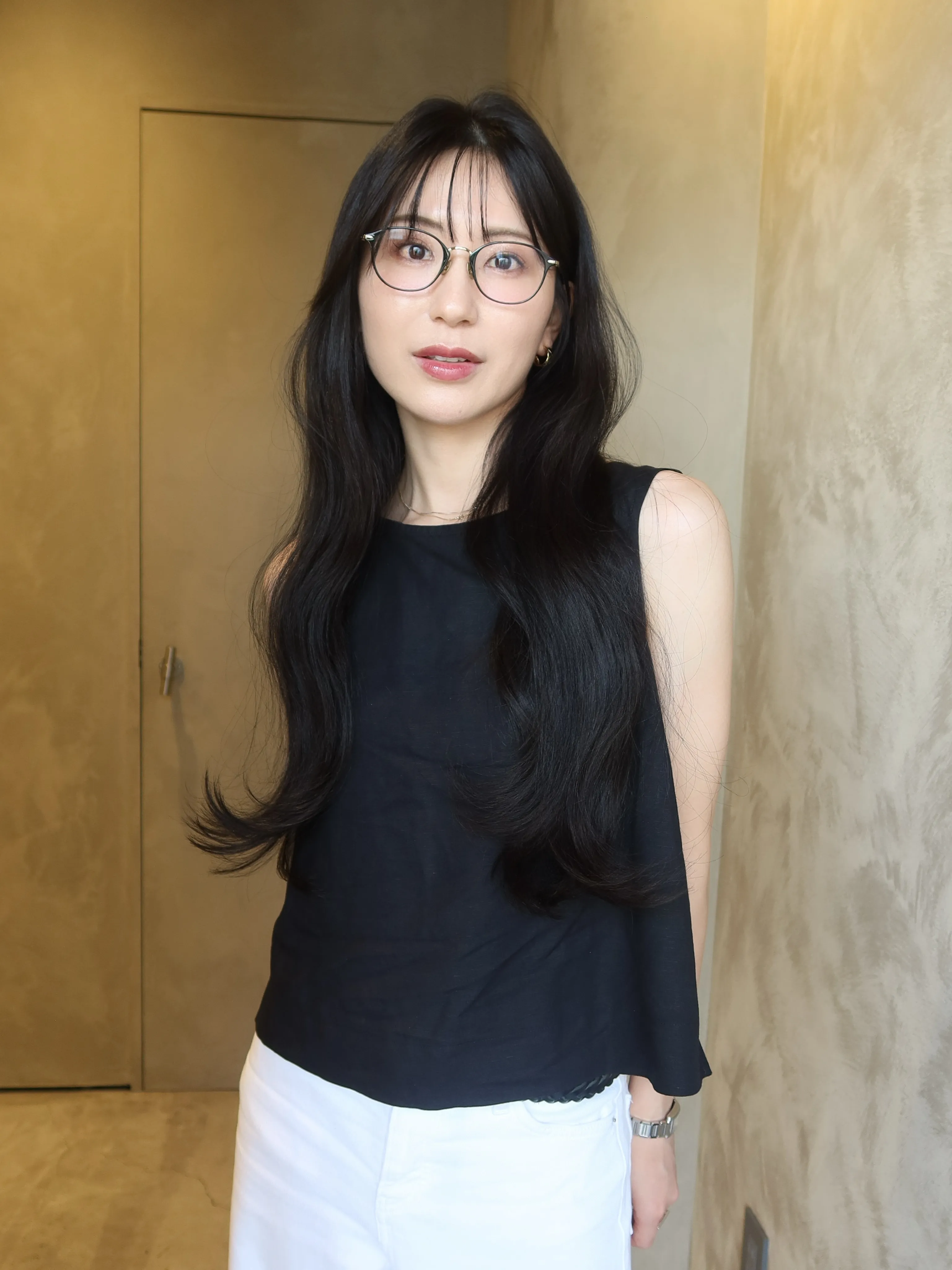 Long Black Curtain Layers showing soft black hair colour