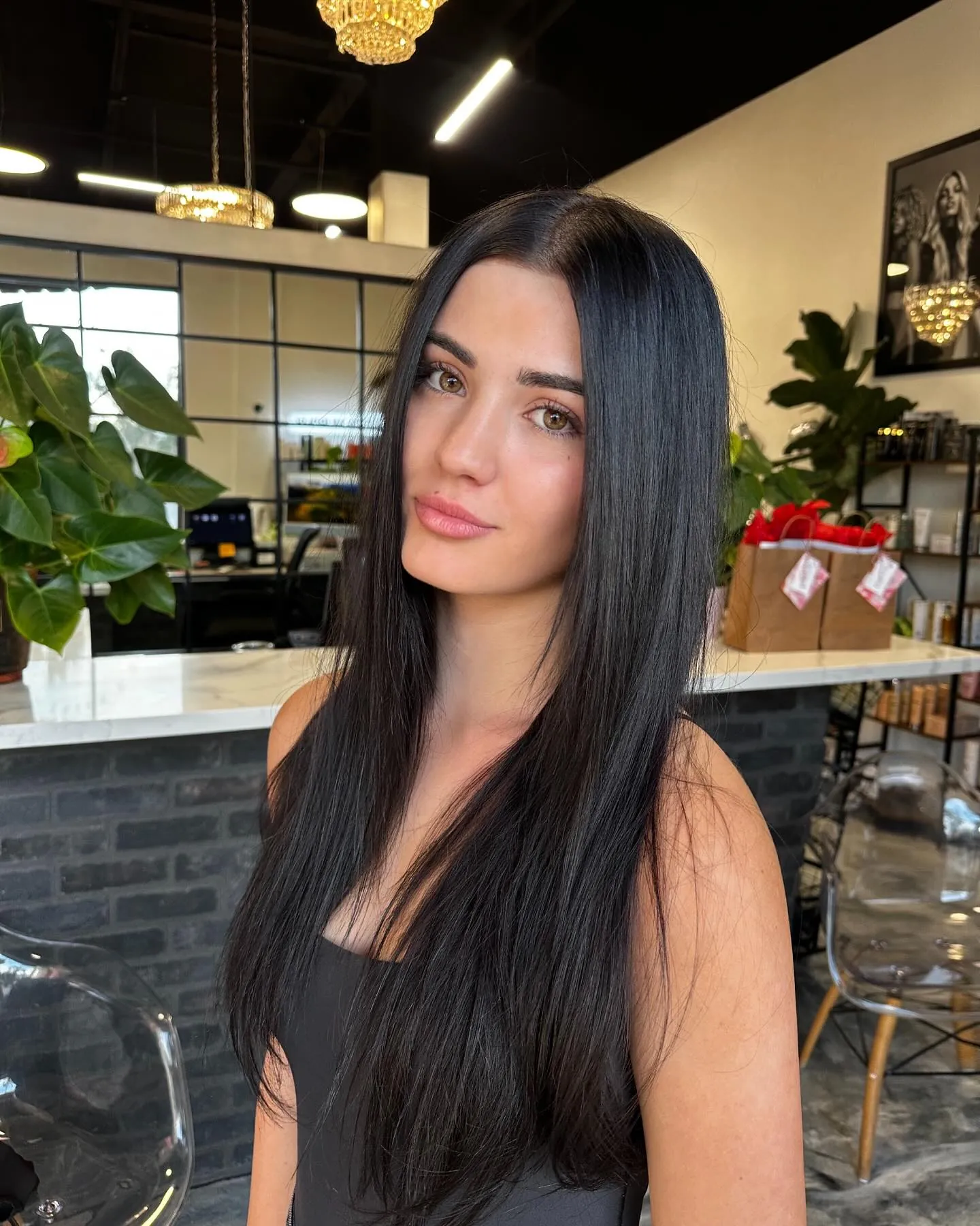Sleek Long Black Hair showing soft black hair colour
