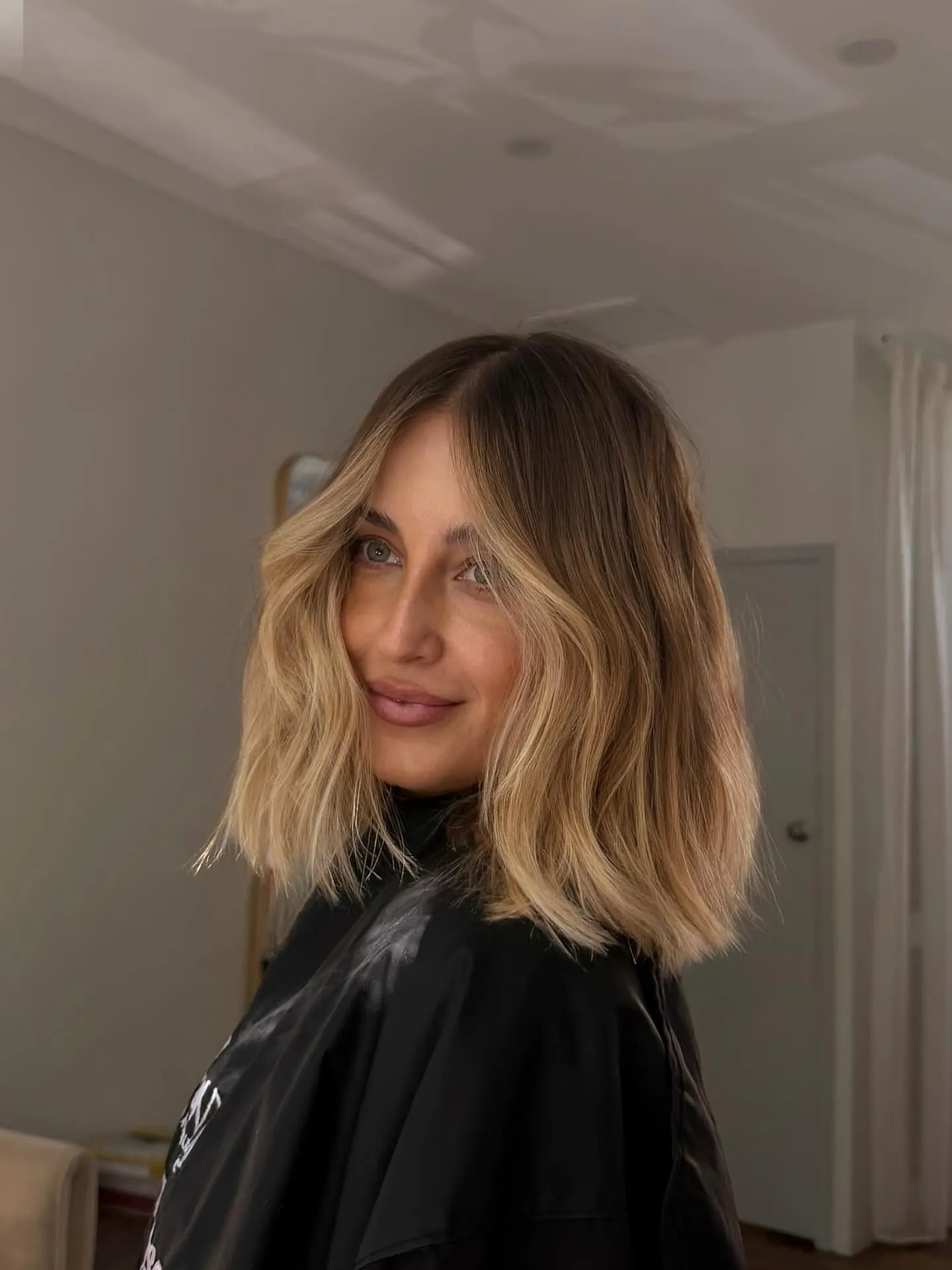 Tousled shoulder-length lob with loose natural waves