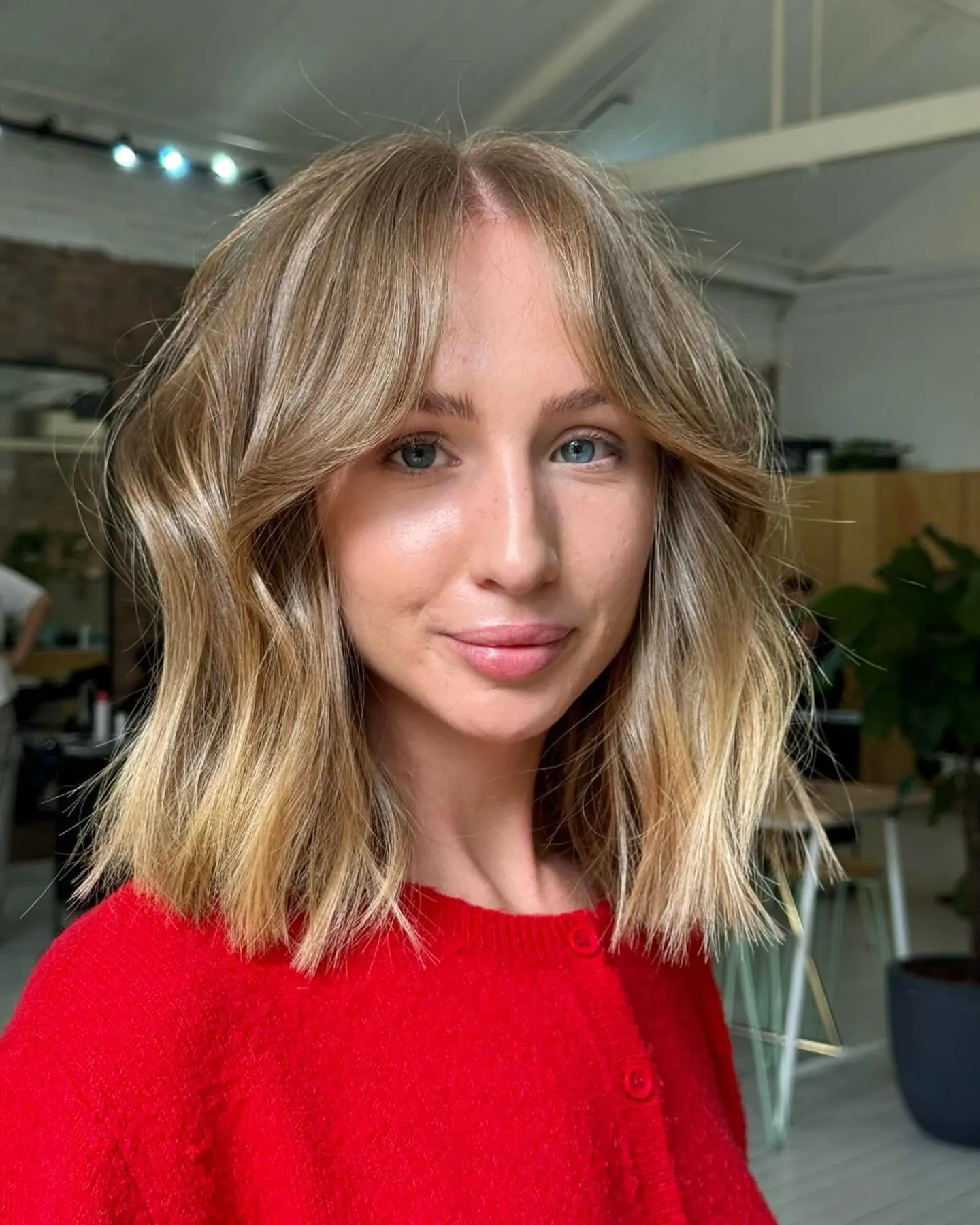 Piecey wavy lob with center part and separated ends