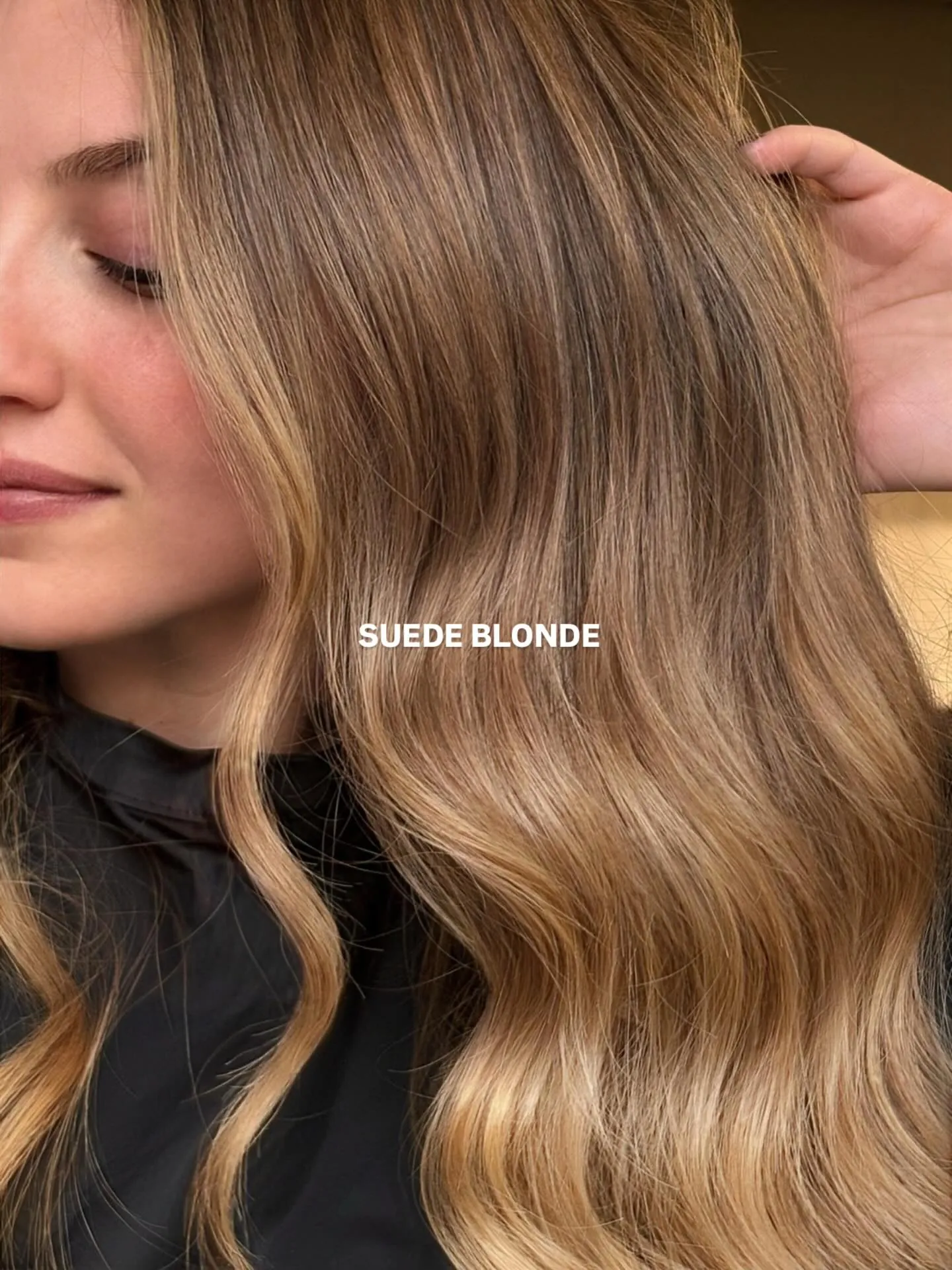 Glossy suede blonde waves with smooth blended tones