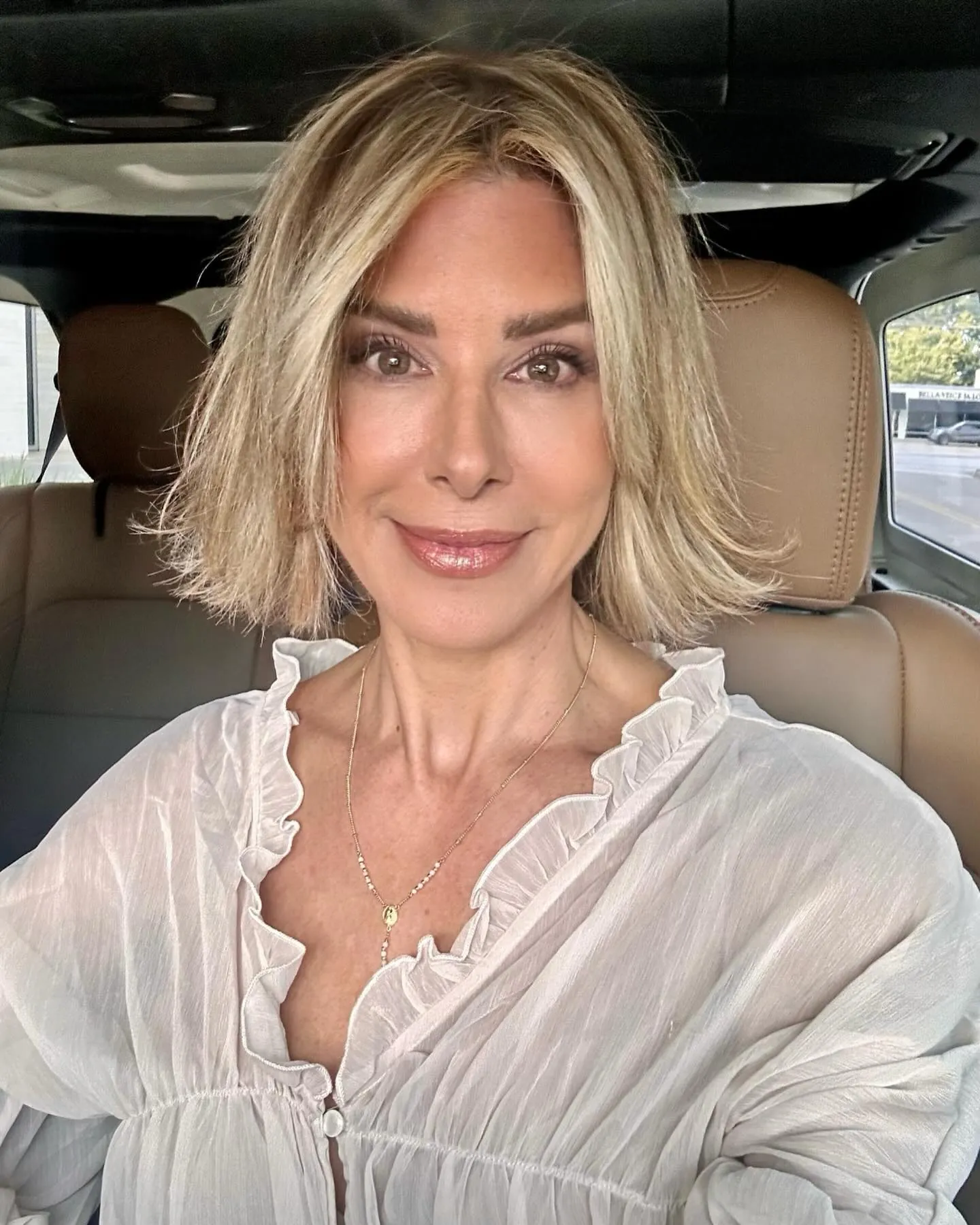 Tousled short blonde bob with soft layers