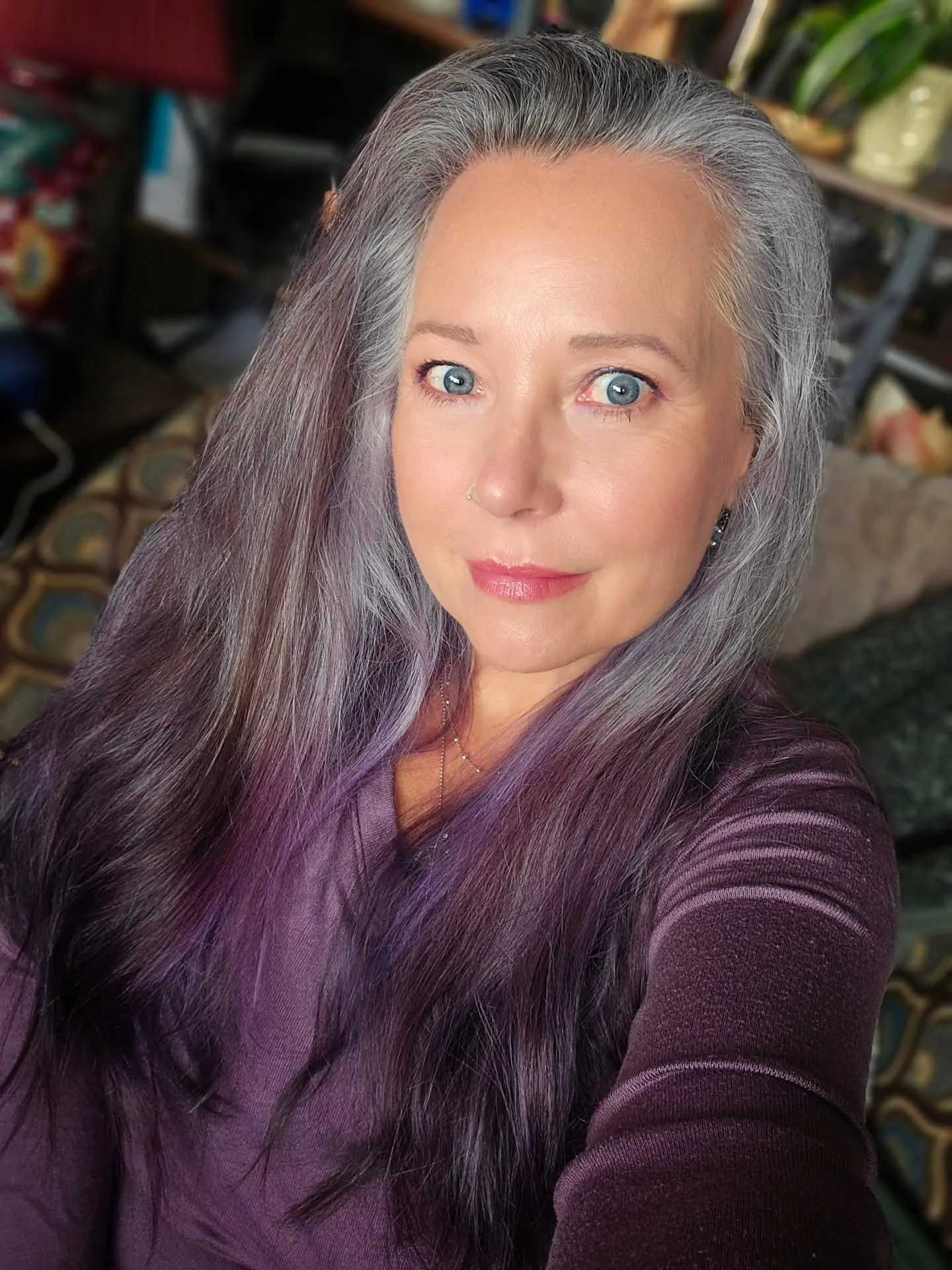 Long gray hair with smooth side-swept layers