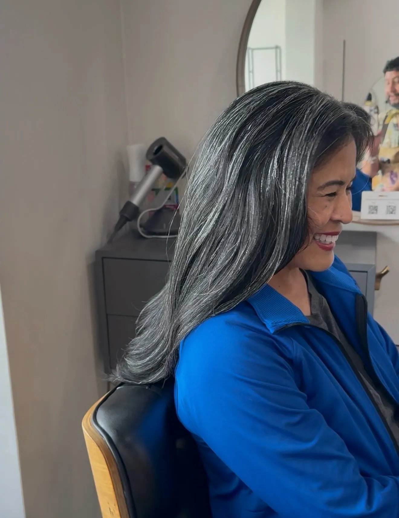 Long sleek silver hair with softly curved ends