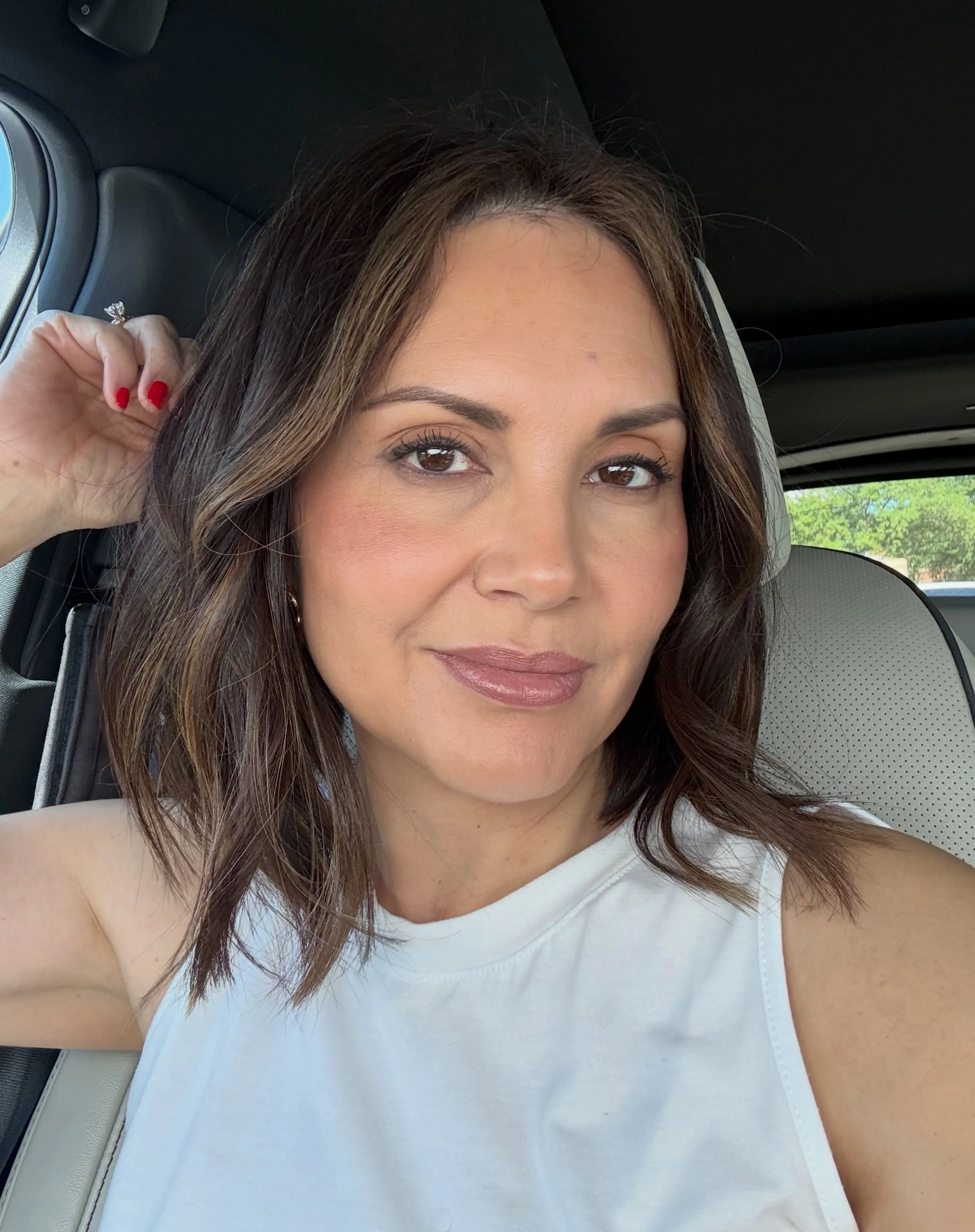 Soft layered brunette lob with loose bends