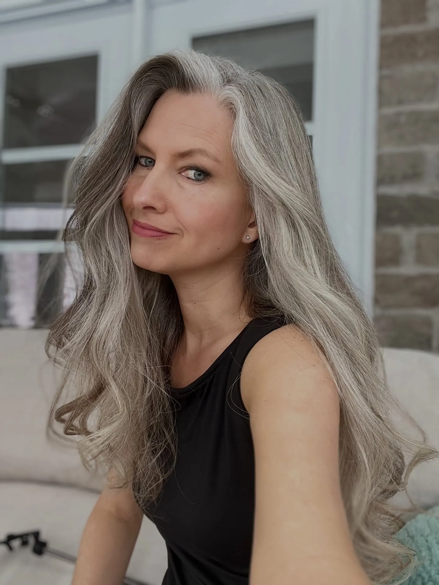 Long silver hair with loose side-parted waves