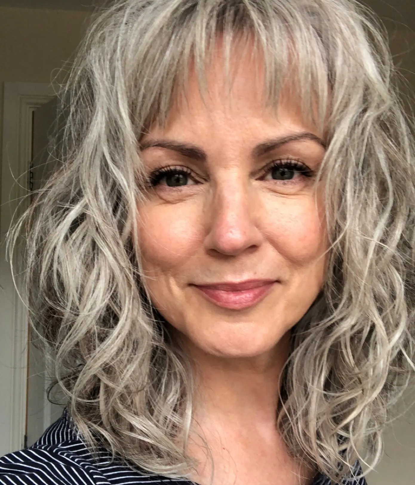 Curly silver shag with textured bangs