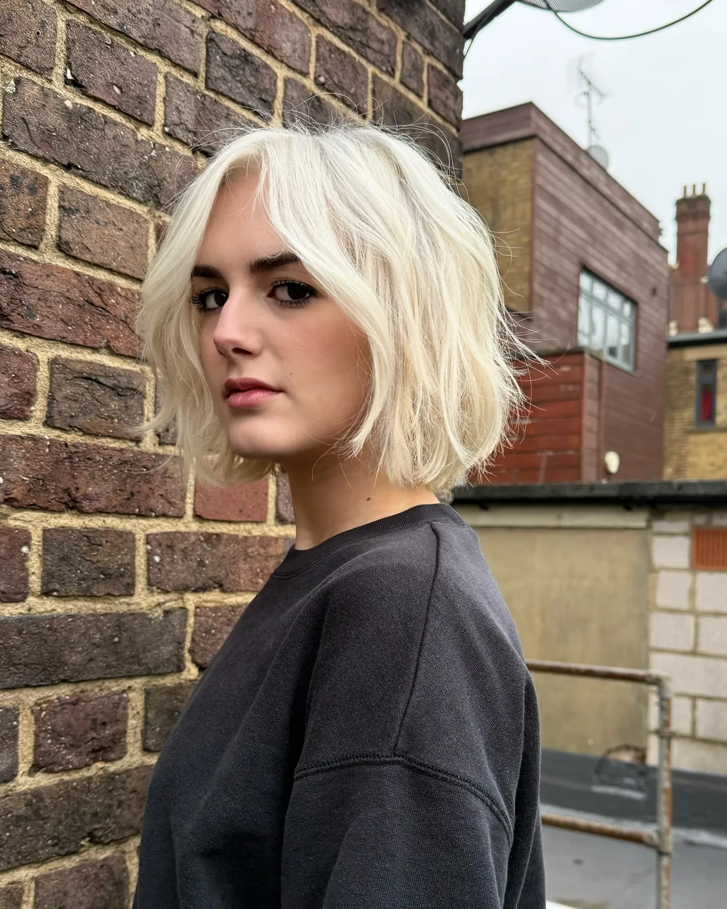 Soft platinum bob with loose bend