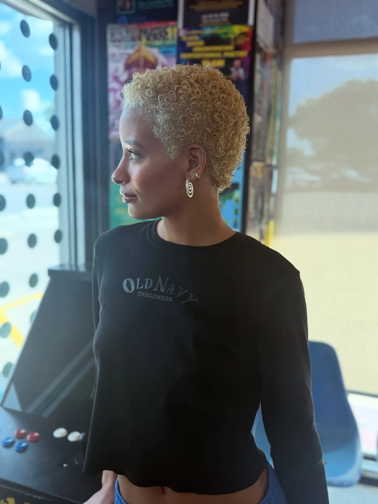 Very short blonde crop with natural texture