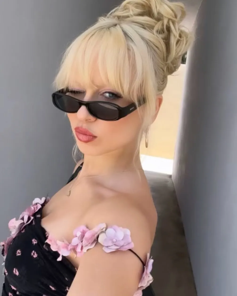 Blonde braided updo with full fringe