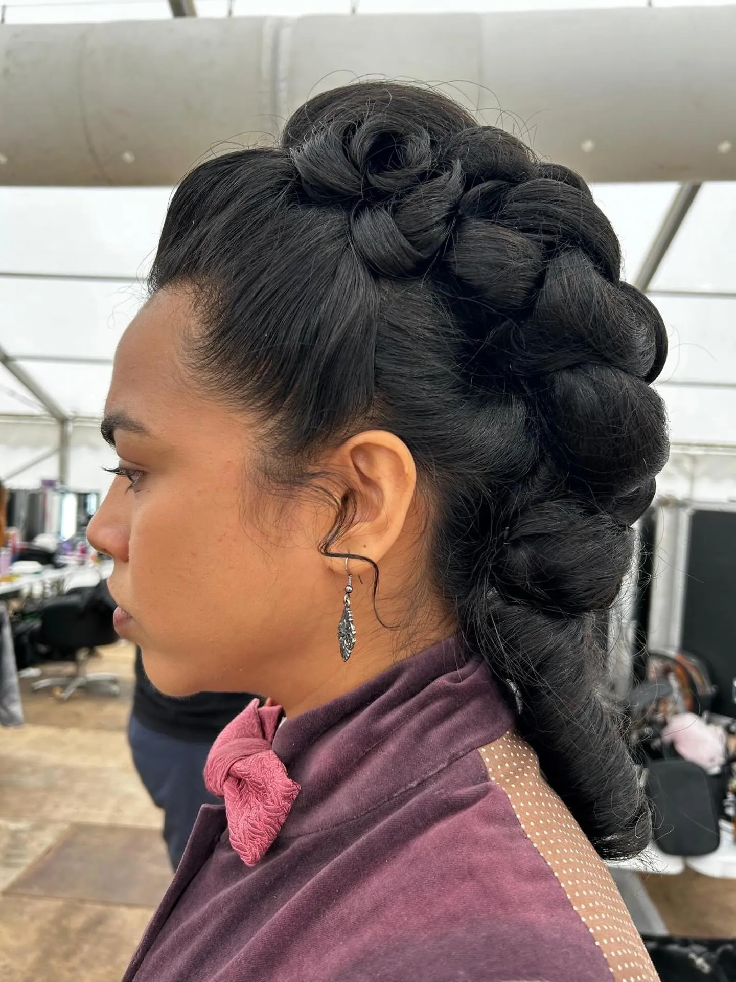 Victorian-inspired braided crown with thick long plait down the back