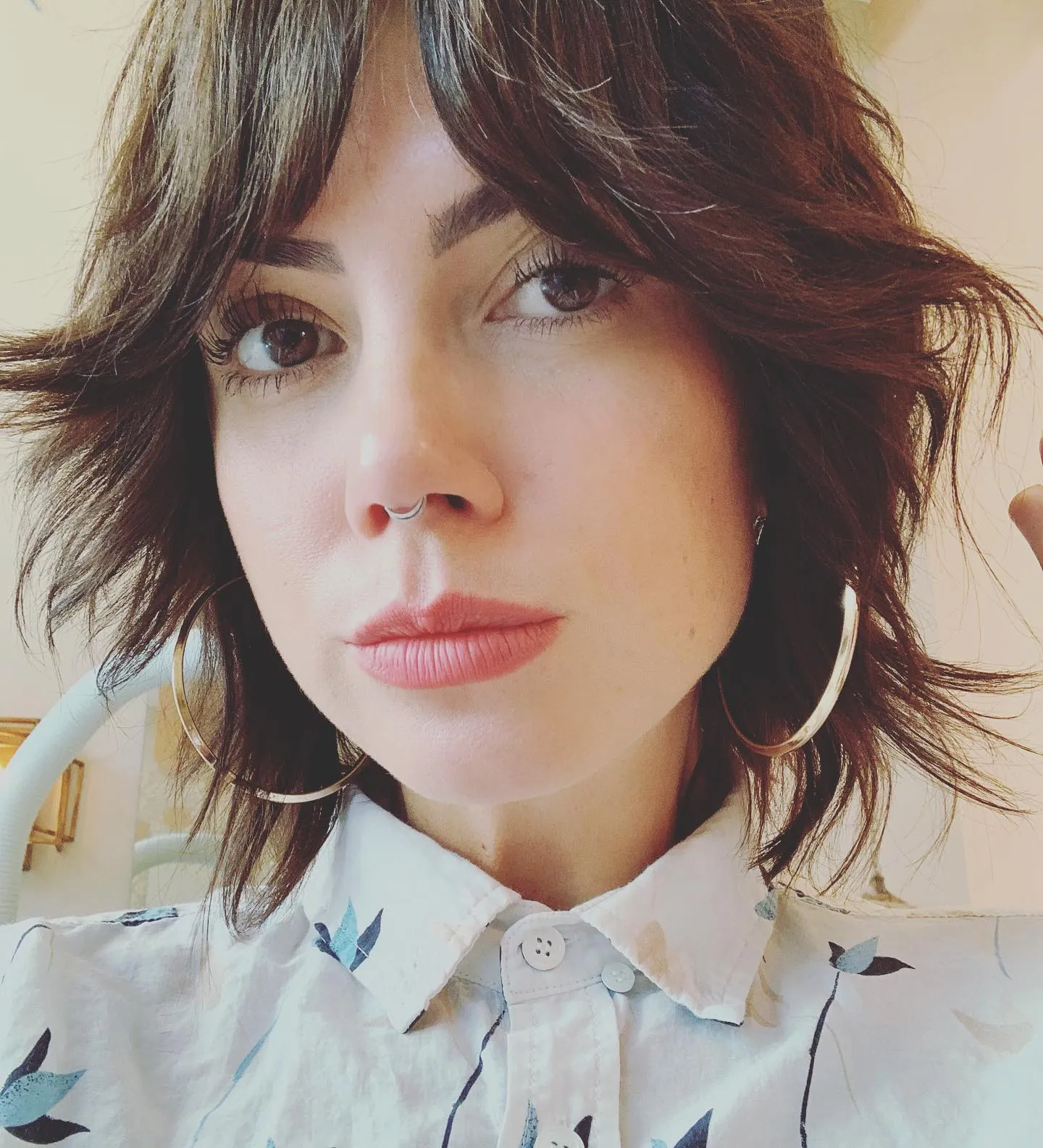 Short layered shag with center-split curtain fringe