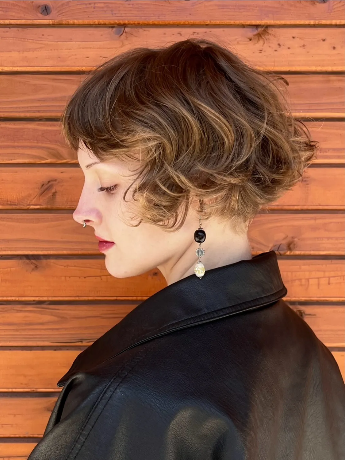Short bob with sculpted finger waves along the side