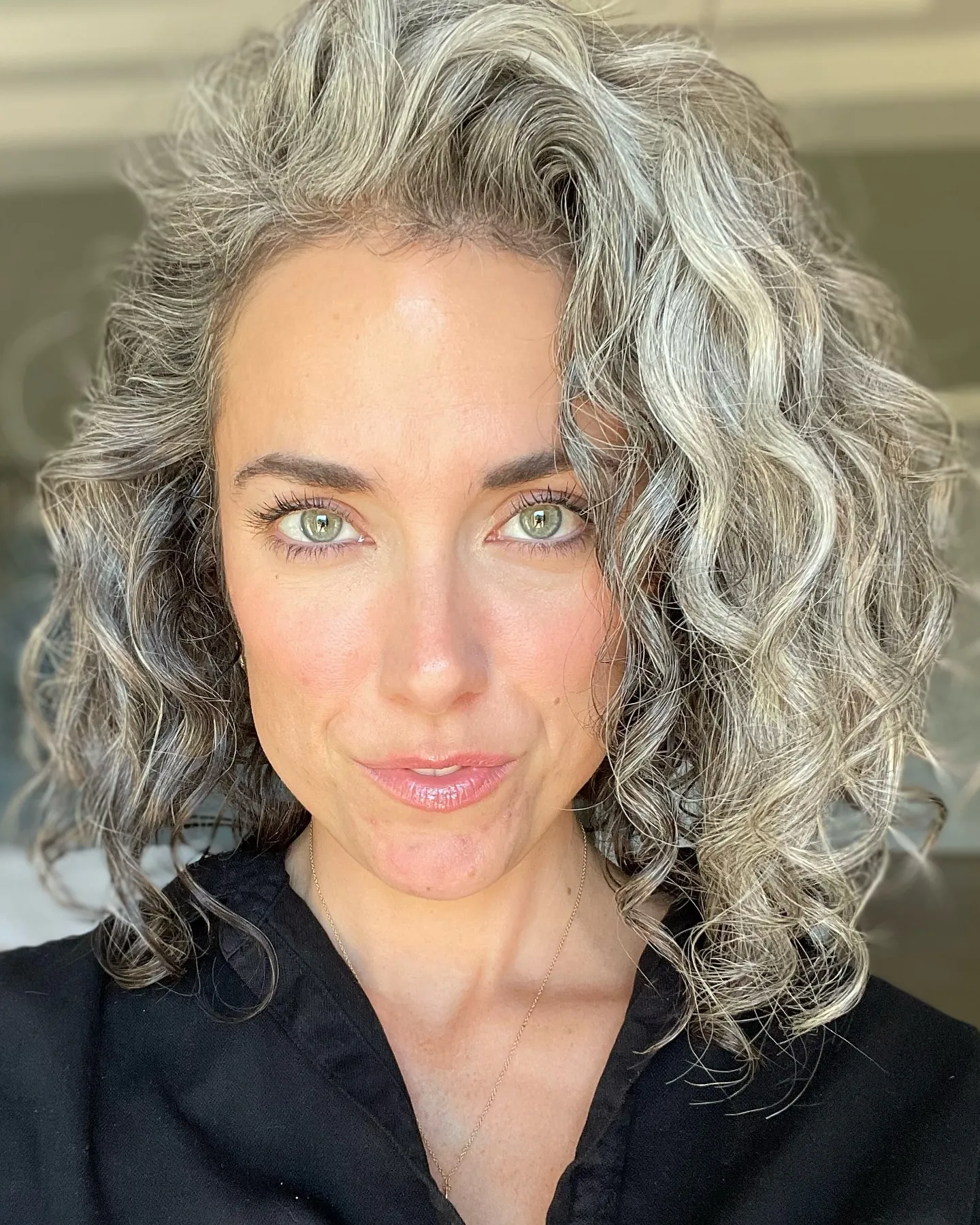 Silver wavy lob with a deep side part