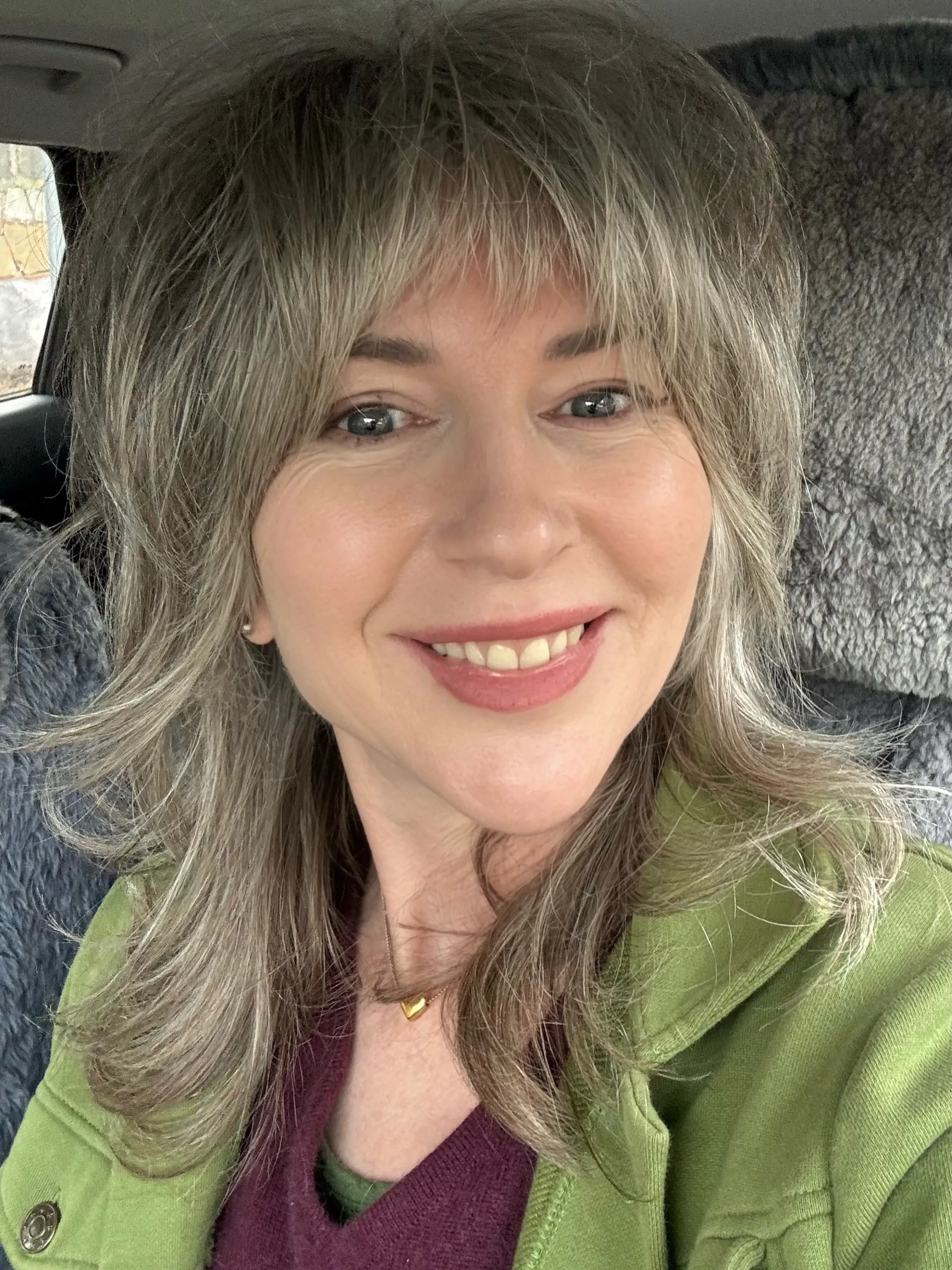 Medium-length wavy shag with soft bangs