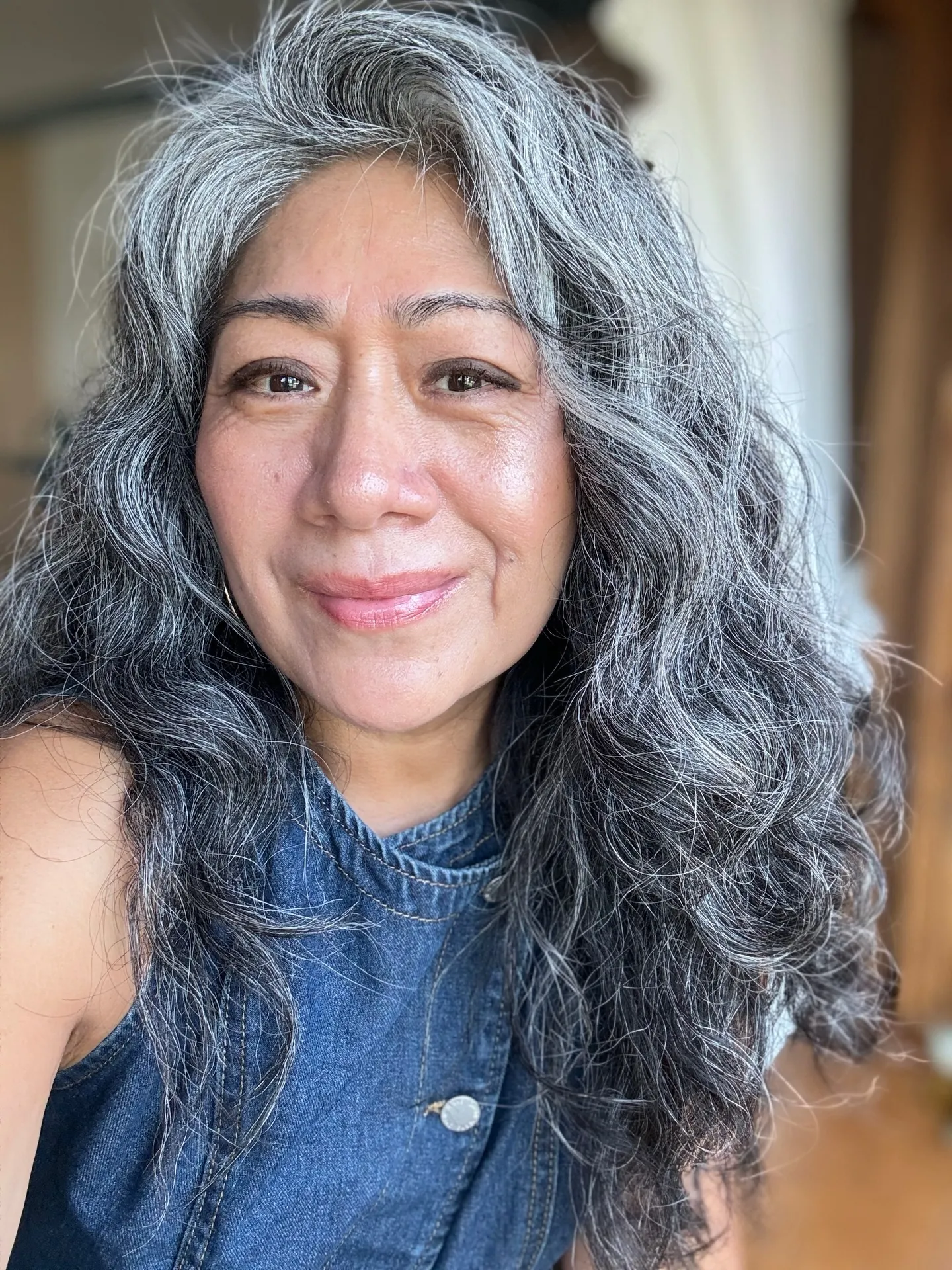 Long gray waves with layered face-framing pieces