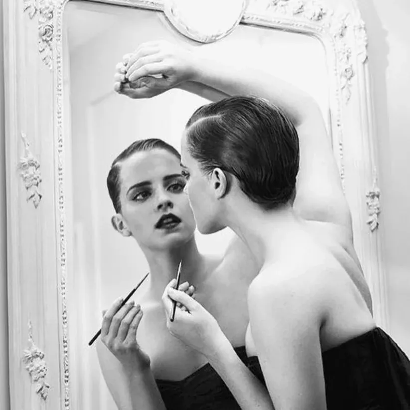 High-shine pixie slicked smoothly away from the face